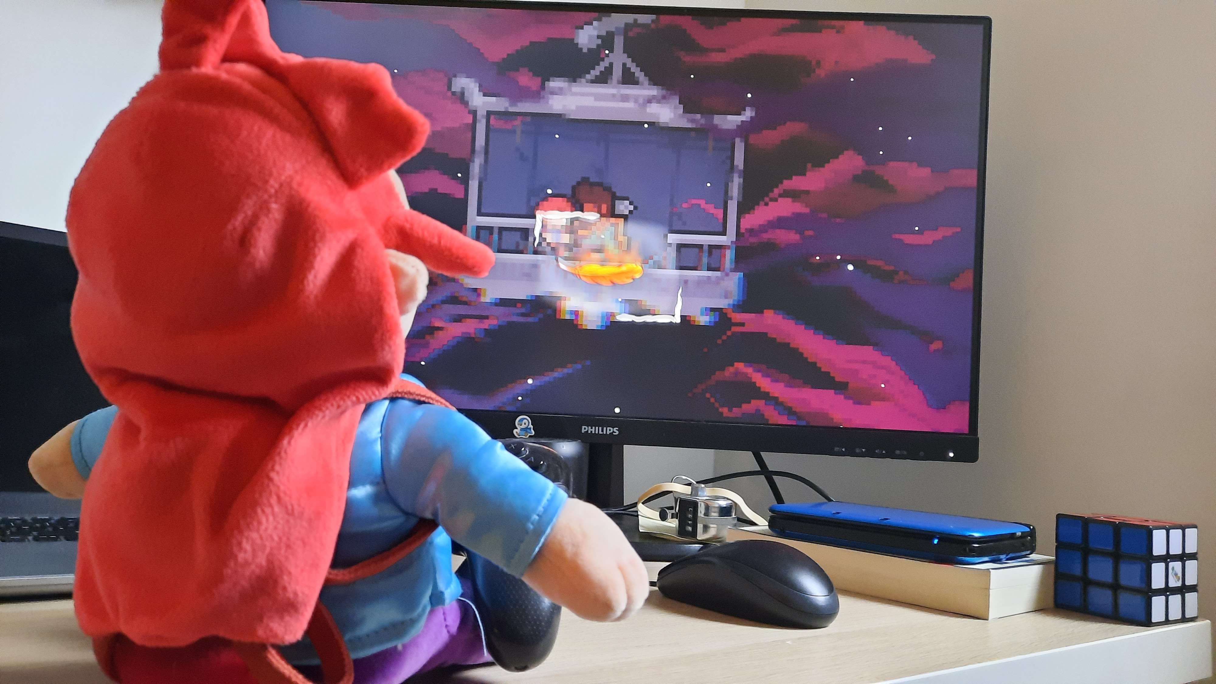 The same scene from earlier, madeline is being held by theo on the failing gondola. The tentacles seem to retreat slightly, the screen grows brighter and the framing is much less oppressive.